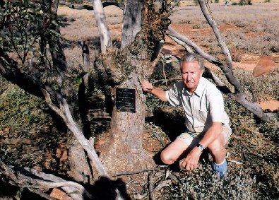 Ray Ackroyd at John's Tree and details written on John's memorial palque